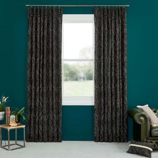 Abigail Ahern Beats Haze Curtains set against dark teal walls