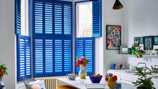 Custom colour shutters in blue in kitchen