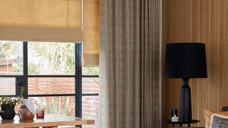 Roman Blind in Lindora Gold paired with Curtains Verve Golden Wheat Lindora Gold Roman Blind and Verve Golden Wheat curtains in Dining Room