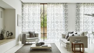 White Patterned Made to Measure Voile Curtains in the Lounge - swirl dusk