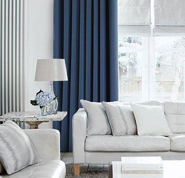 Tetbury Wedgewood Curtains in living room with light grey sofa