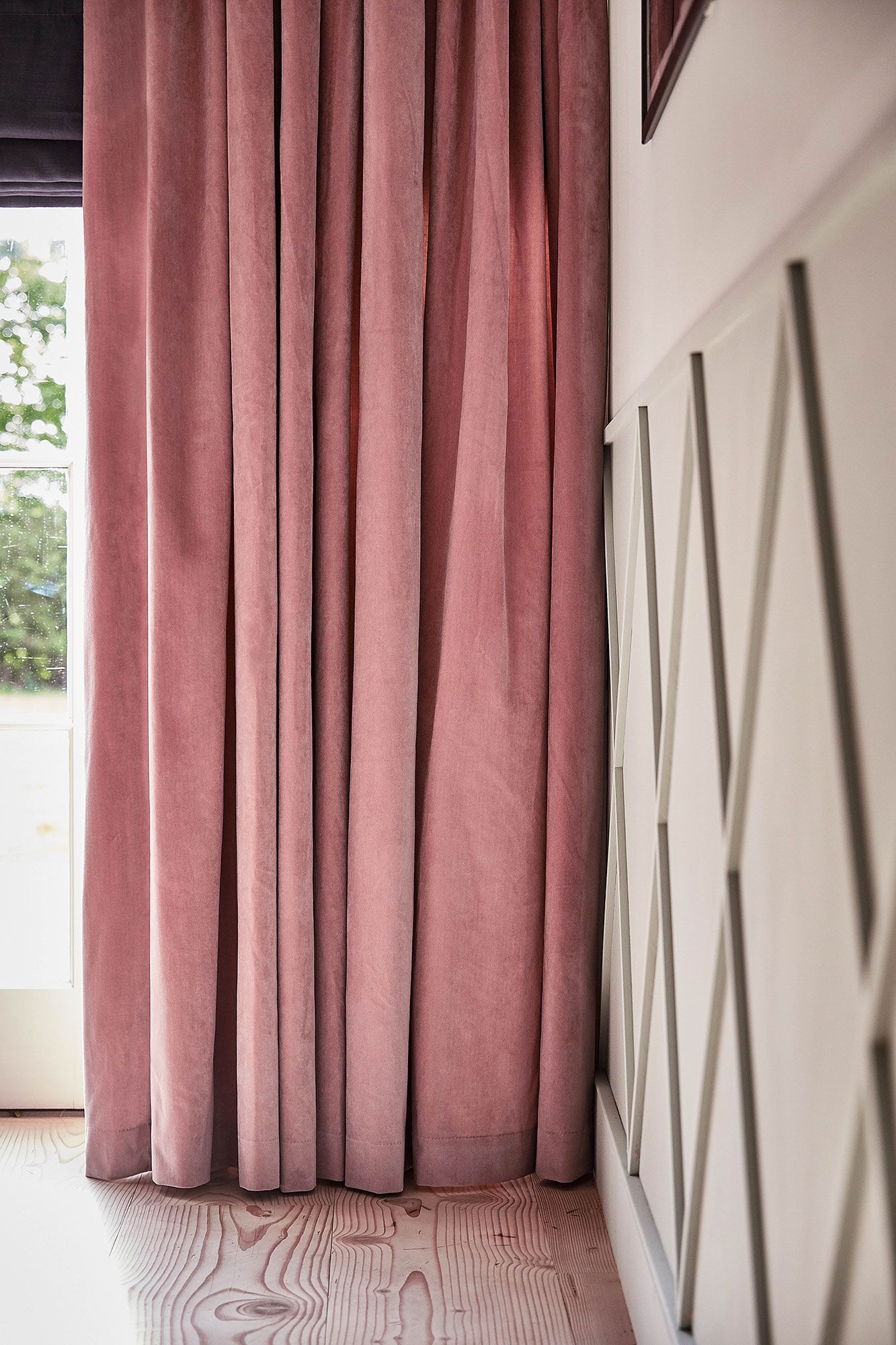 Malone Rose curtains and Allure Midnight romans in living room