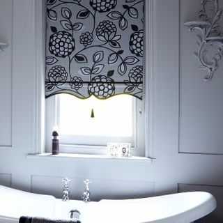 Black and white Serena Monochrome roller blind hung in bathroom