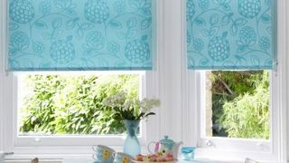 Serena Teal roller blind in dining room