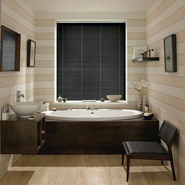 Aluwood Black Gloss Venetian blinds in a cosy bathroom