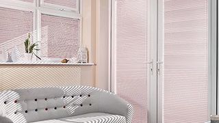 Pink Portfolio Pink Blossom Venetian blinds hanging in patio doors