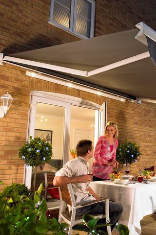 grey-awnings-garden-night
