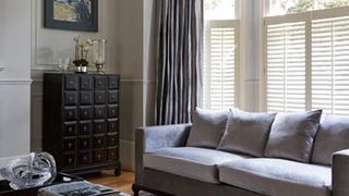Cafe Style White Shutters In the Living Room
