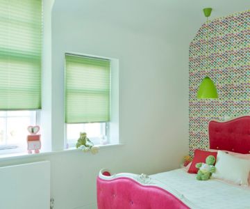 Green pleated blinds