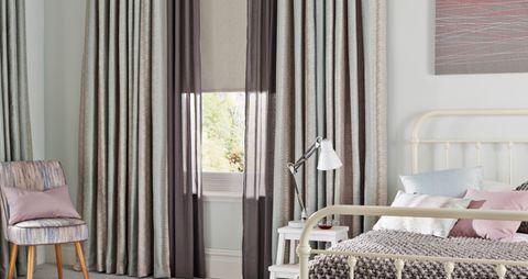 Bedroom with Anouk Blue Mist Curtains and Lyra Grey Tasia Linen Voile Curtains