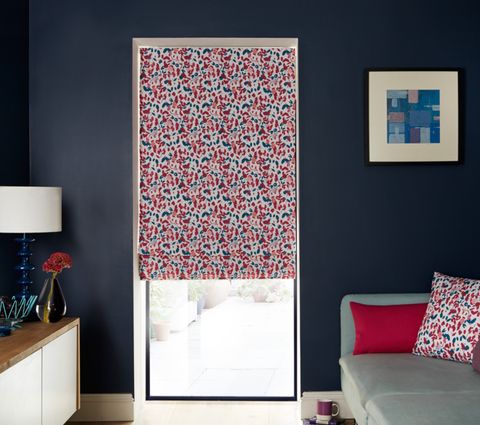 Living Room with Blossom Raspberry Multi Colour Print Roman Blind with Pink and Blue