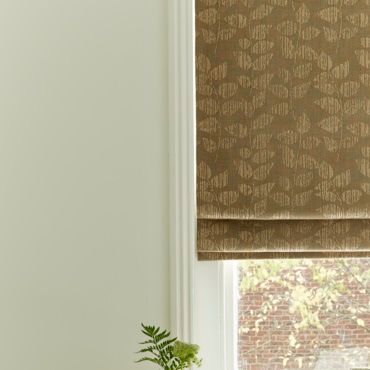 brown roman blinds close up