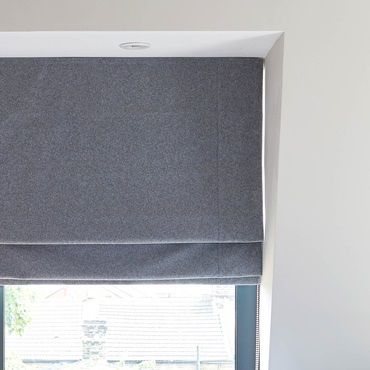 grey roman blinds close up