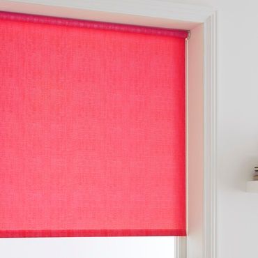 close up of pink roller blinds