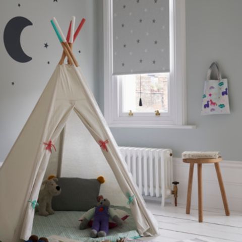 Twinkle Star Grey Roller Blind in a Children's Bedroom with Play Tent and toys