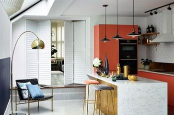 White tracked shutters in kitchen