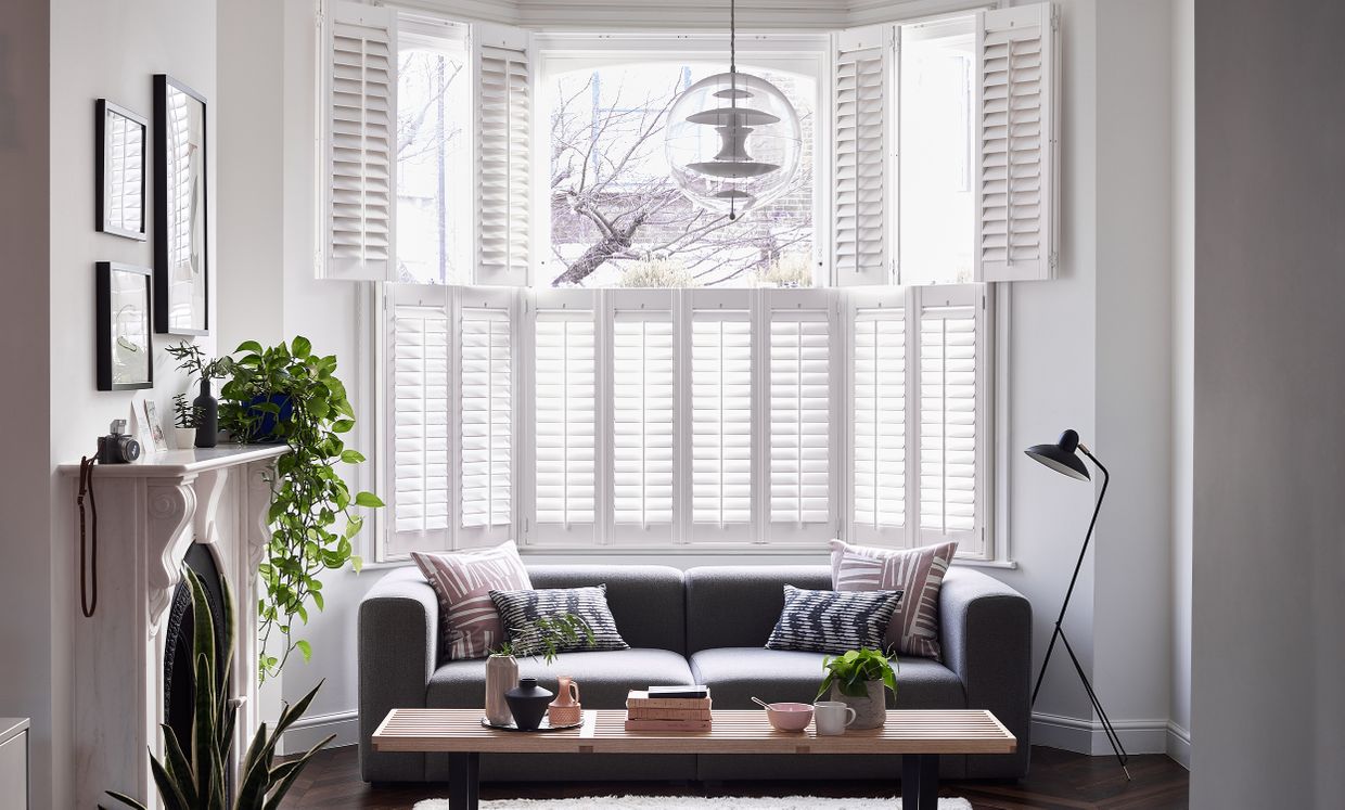 White Windsor Shutters in bay window