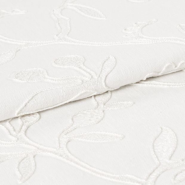 White coloured fabric of Adhara Whisper with detailed stem design woven into the material 