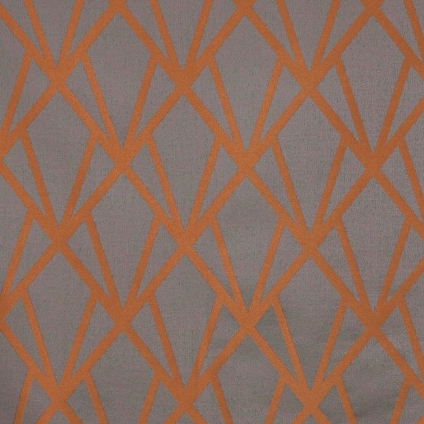 Dimension Ember swatch is a dark grey back ground with a coppery, burnt orange geometric pattern