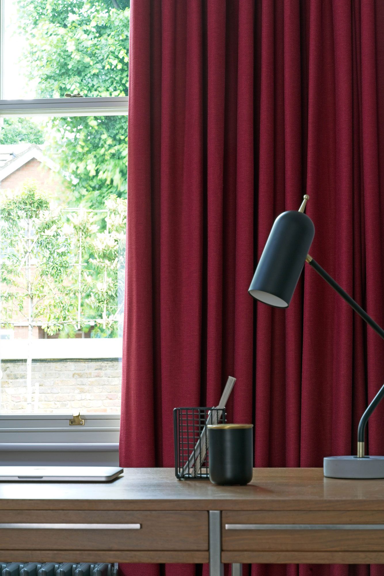 close up of Lindora Ruby curtains in office