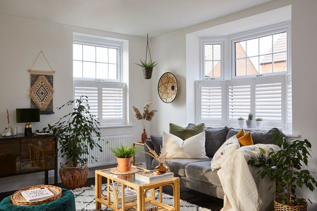 White cafe shutters in a cosy living room