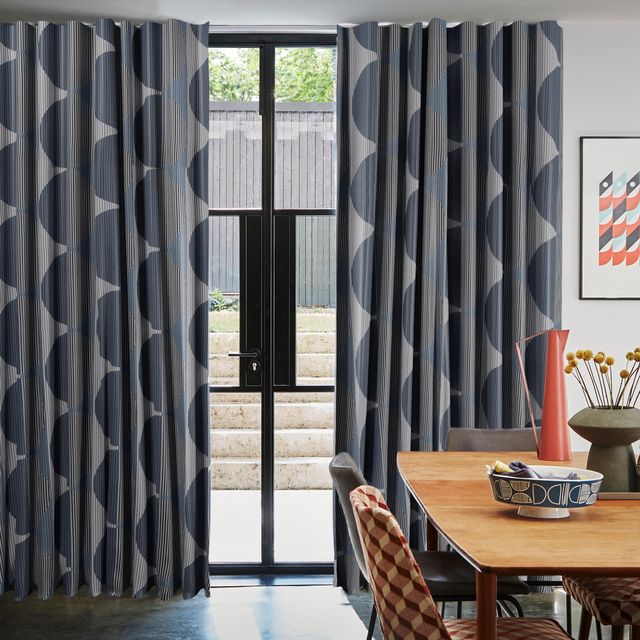 Stella Navy Curtains in a dining room