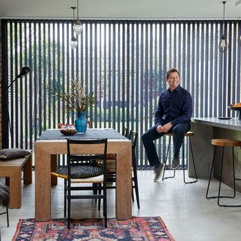 George Clarke in front of Norfolk Charcoal Verticals