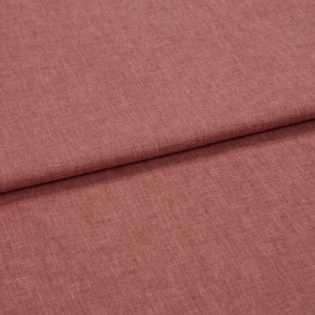 A folded piece of fabric with Harper Punch Pink printed on it