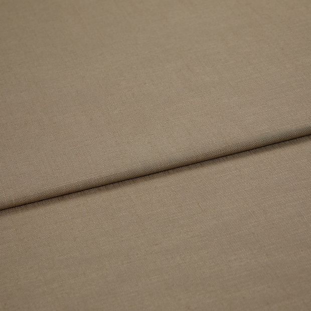 A folded piece of fabric with Faso Taupe Brown printed on it