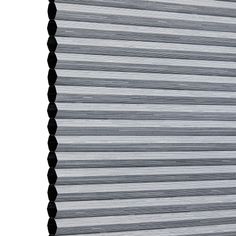 Thermashade Charcoal is a darker grey shade, image has an angle view, showing the side of the pleated blind