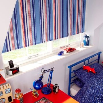 Blue Striped Circus Royal roller blind hung in child's bedroom