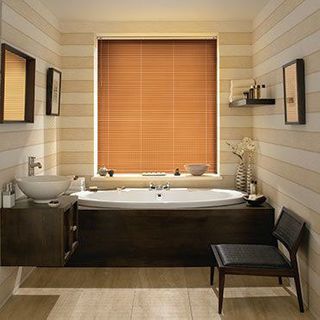 Aluwood Cherry Venetian blinds in a cosy bathroom