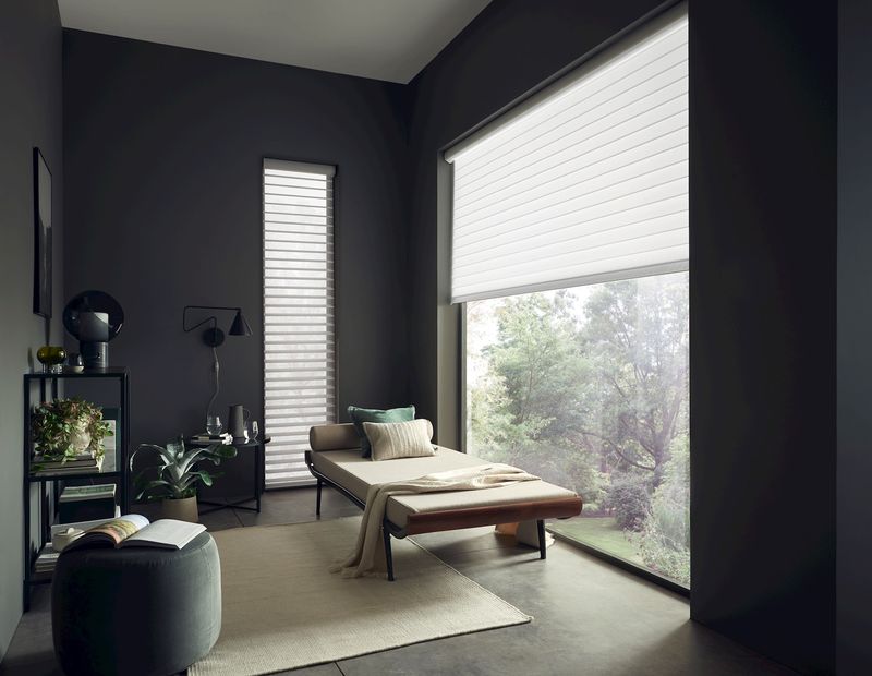 Triple Shade Blind in White covering large window additionally covered by Navy curtains in the small study