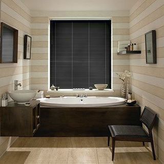 Aluwood Black Gloss Venetian blinds in a cosy bathroom