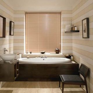 Light Portfolio Latte Venetian blinds in a cosy bathroom