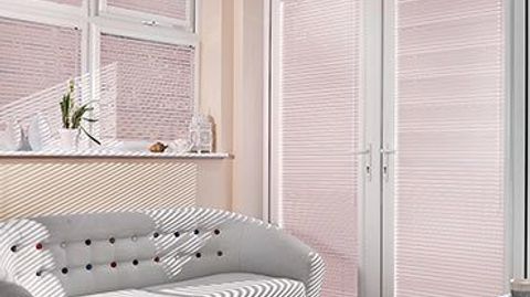 Pink Portfolio Pink Blossom Venetian blinds hanging in patio doors