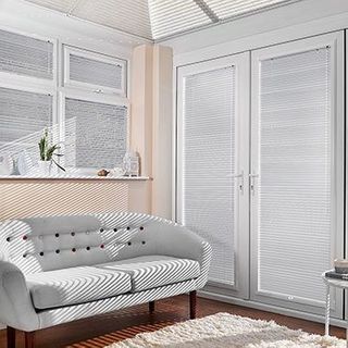 Light Sheer Luxury Pinstripe Venetian blinds hanging in patio doors