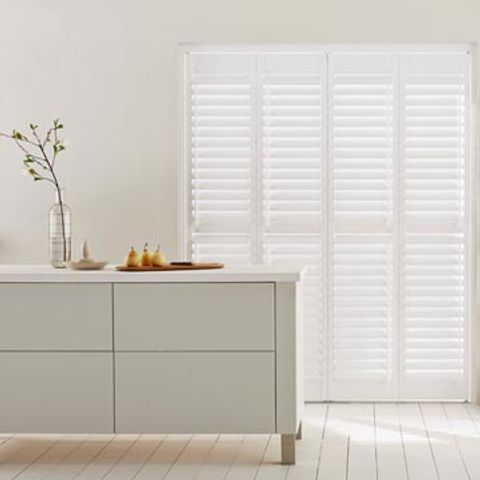 Full Height Warwick Pure White Shutters in Kitchen