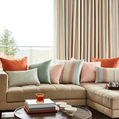 Mishma Dawn Beige Curtains in the Living Room with Sofa and Pastel Coloured Cushions