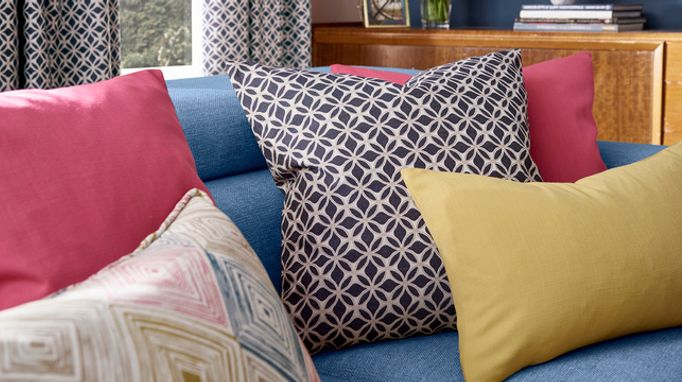 Sophie Robinson colour clash cushions close up