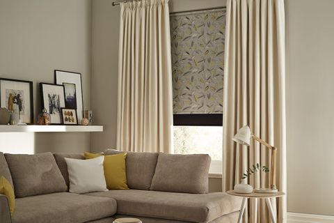 Neutral and cosy living room with Cream curtains 