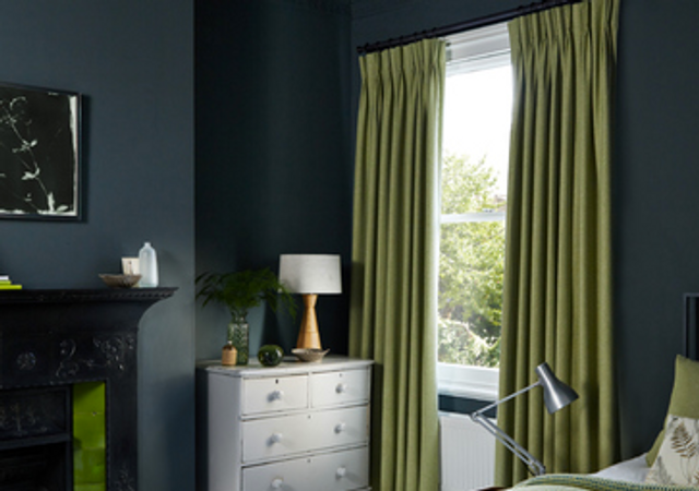 Dark Bedroom with Green Pinch Pleat Curtains and matching accessories