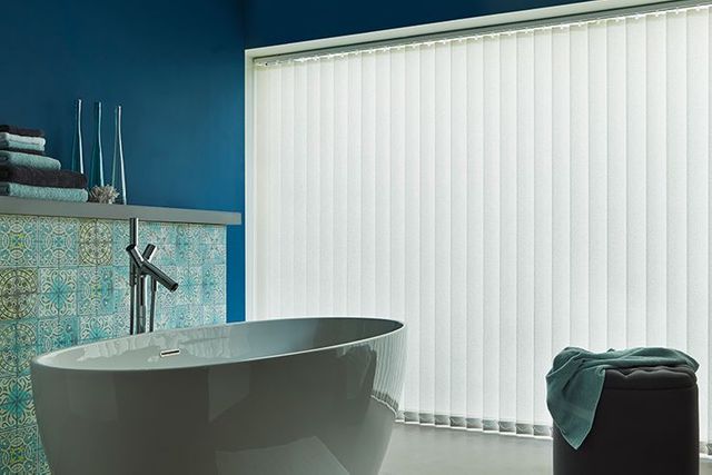 Bathroom window with ivory Vertical blinds