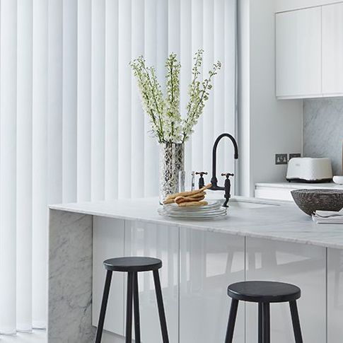 modern kitchen diner with silver vertical blinds