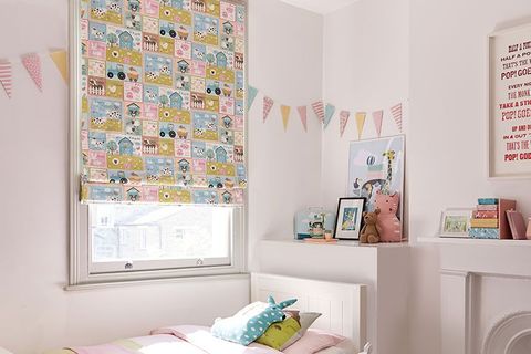 colourful farm animal pattern blinds in a kids bedroom 