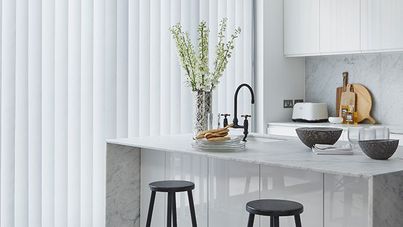 modern vertical blinds in a stylish kitchen window 