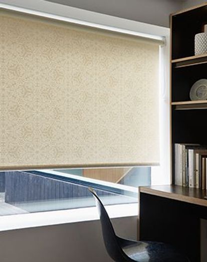 cream roller blinds in a modern home office 