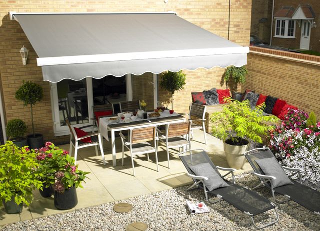 Grey awning overlooking patio furniture