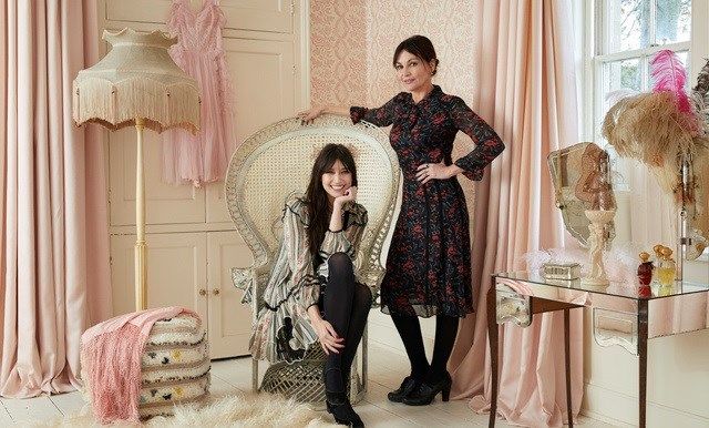 Pearl and Daisy Lowe in a room that has vintage decorations in white and blush colours