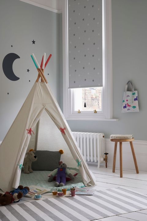 Children's room with a Patterned Roller Blind in twinkle star fabric